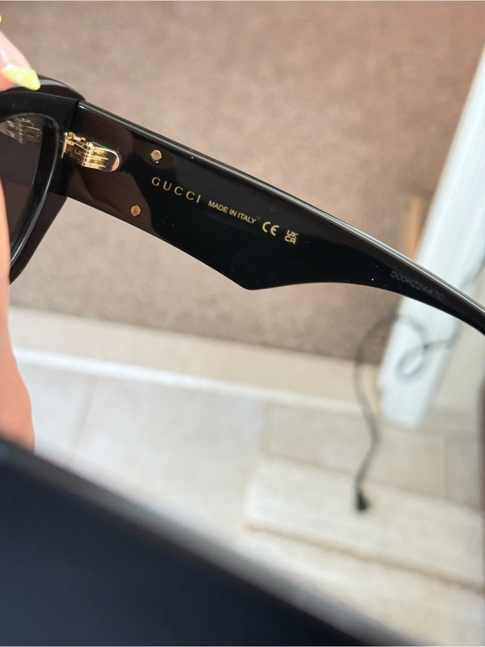 Gucci Black Cat-Eye Sunglasses with Dark Lenses